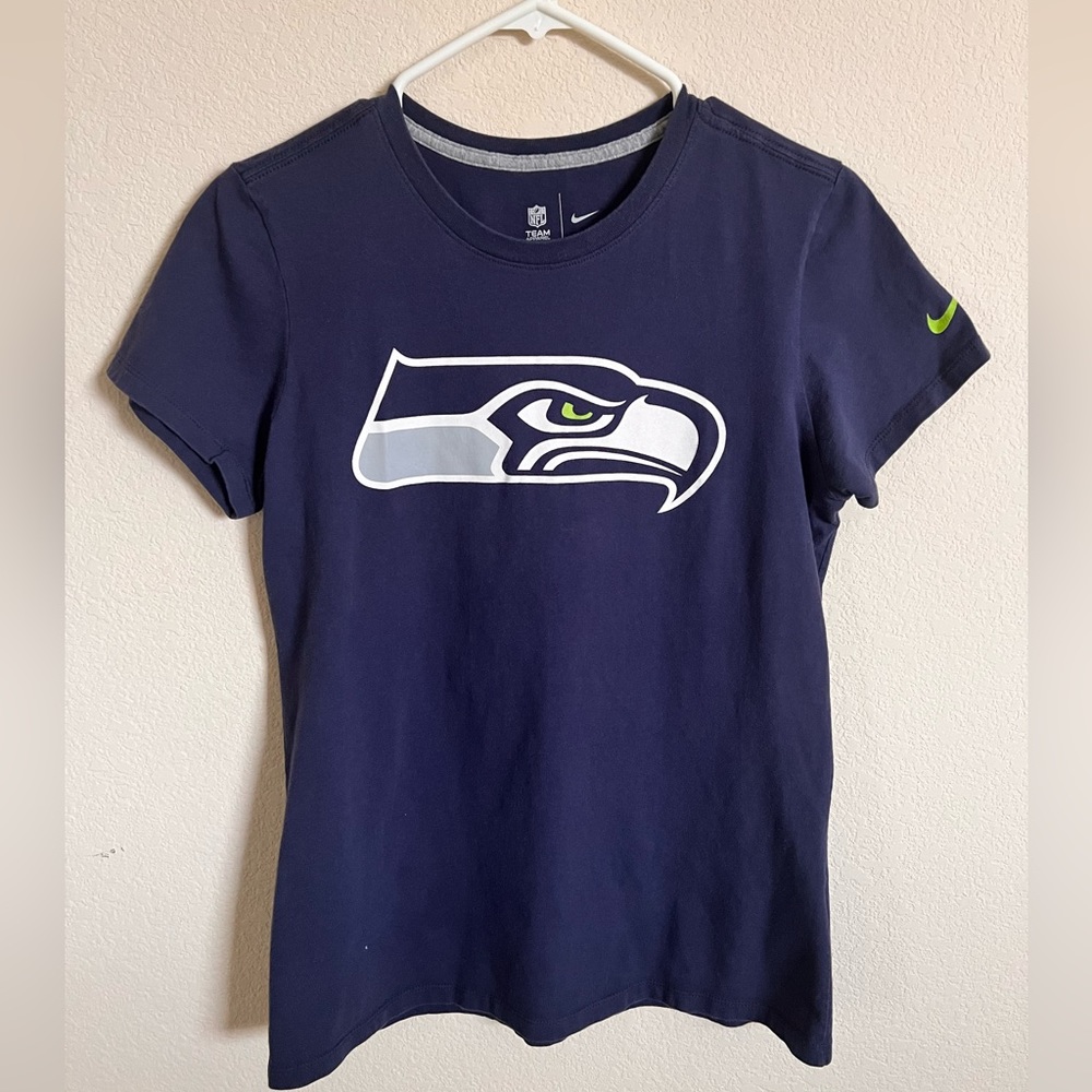 Nike: NFL team Seahawks T-shirt in Blue. Size Large but runs smaller.